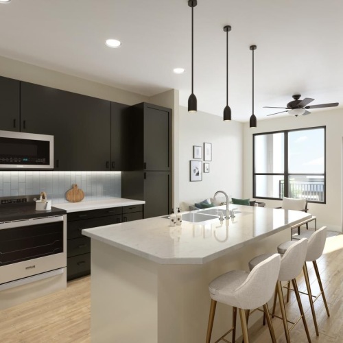 a kitchen with a table and chairs