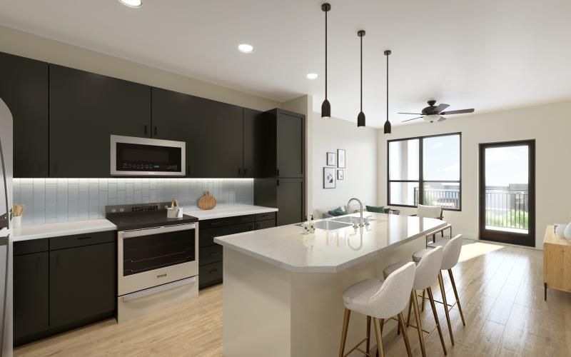a kitchen with a table and chairs