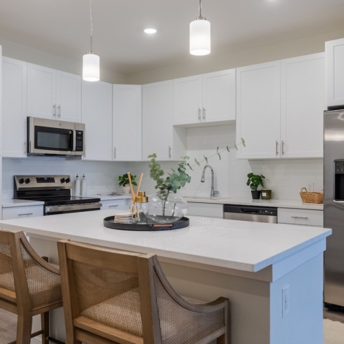 a kitchen with stainless steel appliances